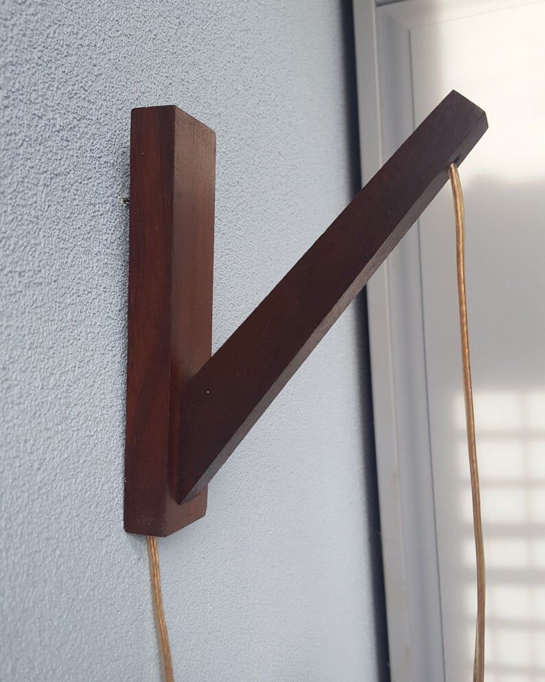 Wooden applique with 60s glass blind