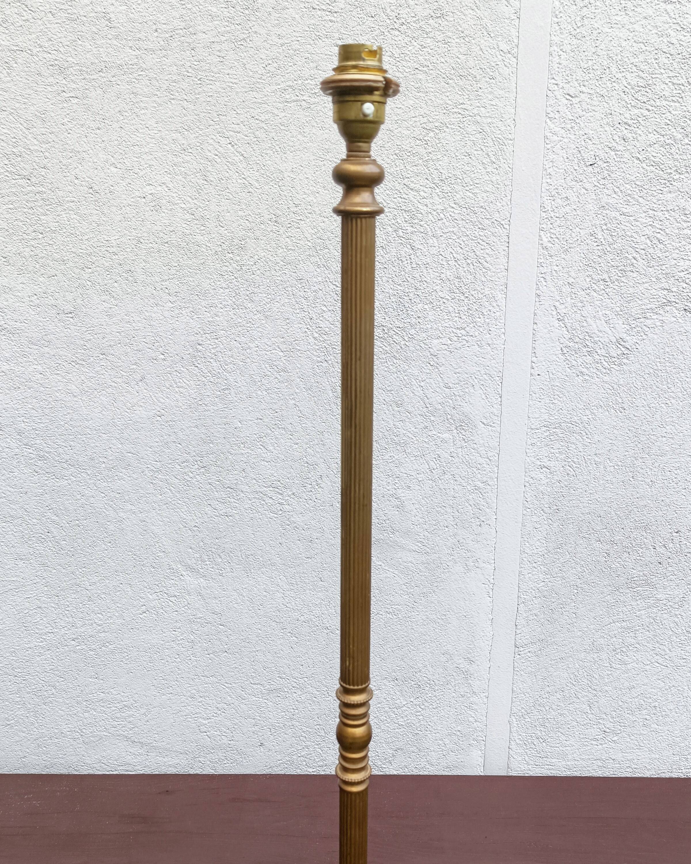 Brass tripod floor lamp