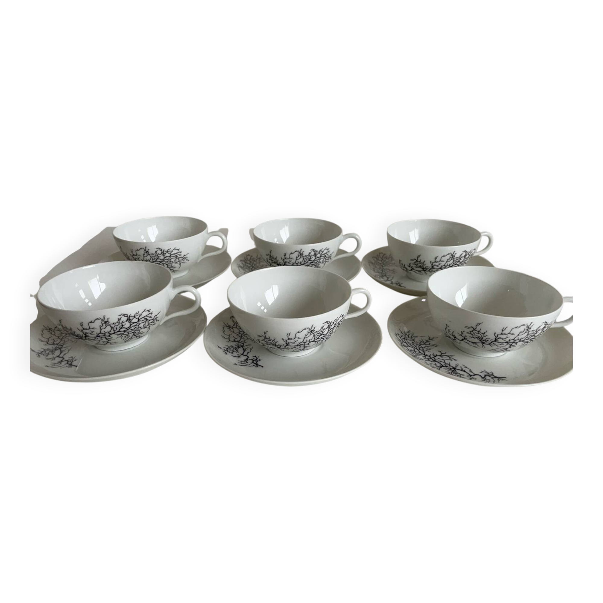 Françoise Adnet “Black Coral” 6-cup and saucer set – Pork