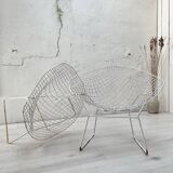 Pair of armchairs in white patinated mesh metal.