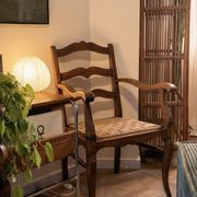 Pair of Provençal armchairs, wood and woven cord — mid-20th century