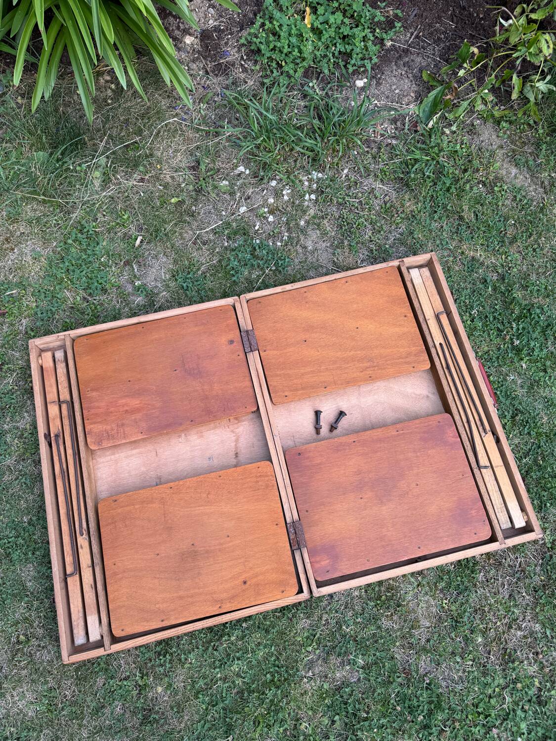 Old suitcase, table and stools, vintage wooden picnic