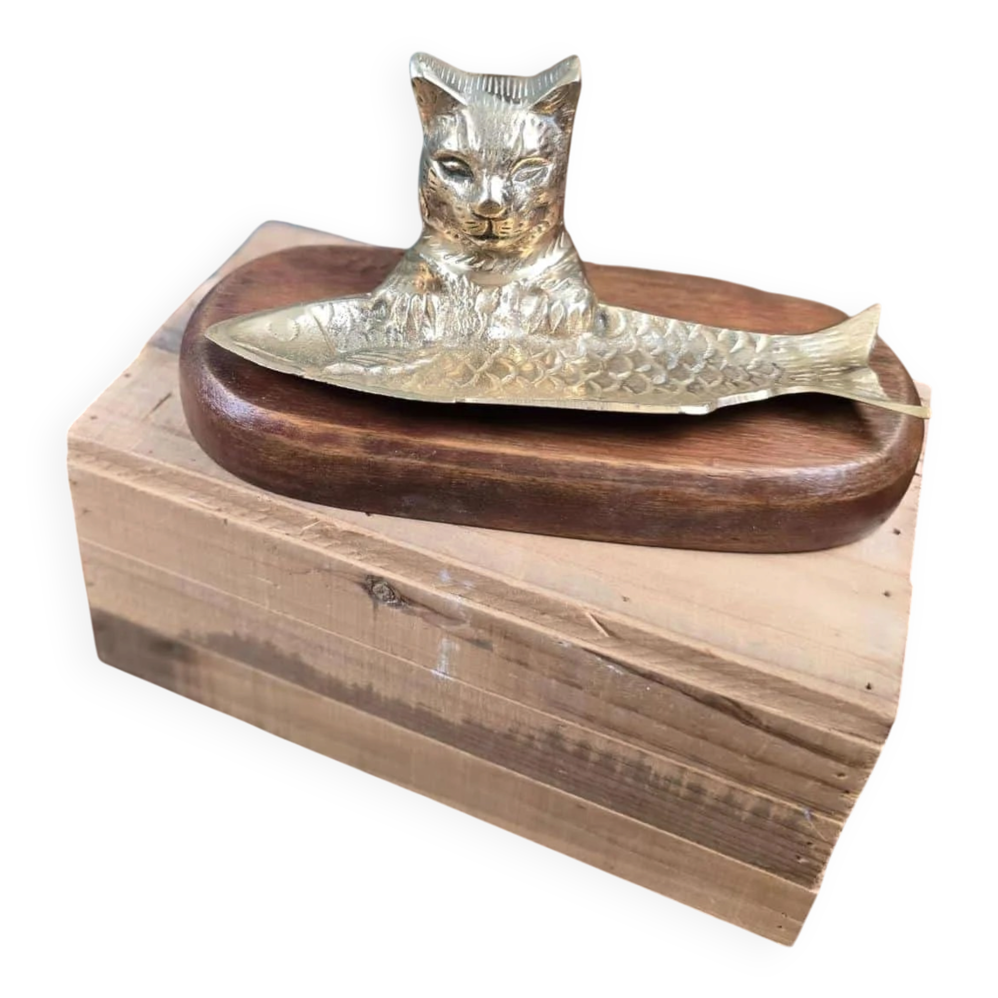 Vintage cat fish catchall in brass on a solid wood base.