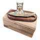 Vintage cat fish catchall in brass on a solid wood base.