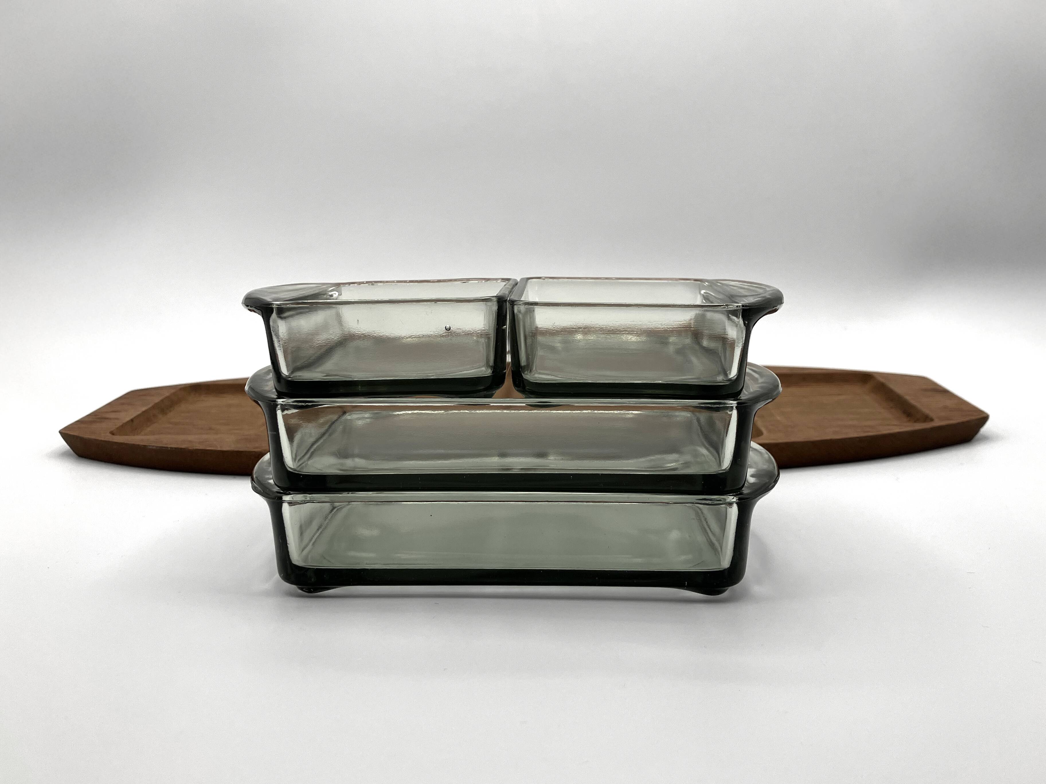 Teak tray and its 4 stackable glass dishes • Denmark • 1960
