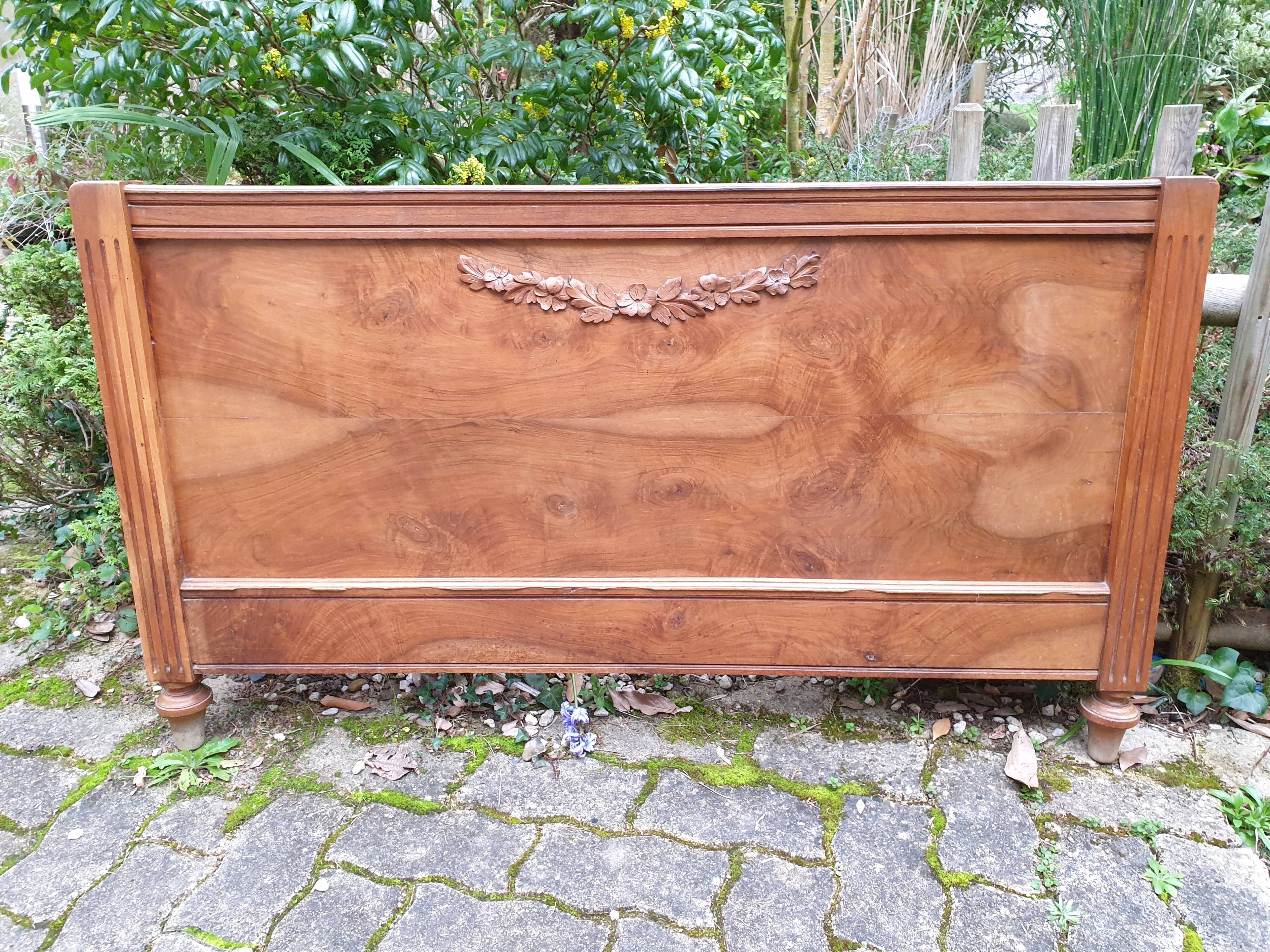 Carved walnut headboard