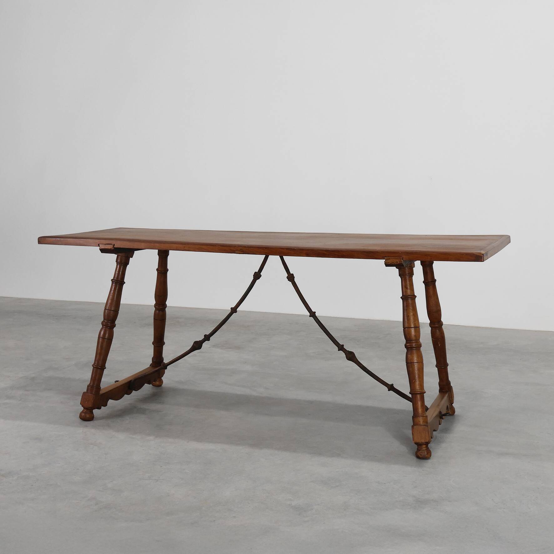 18th‑Century Spanish Walnut Trestle Table with Iron Stretcher