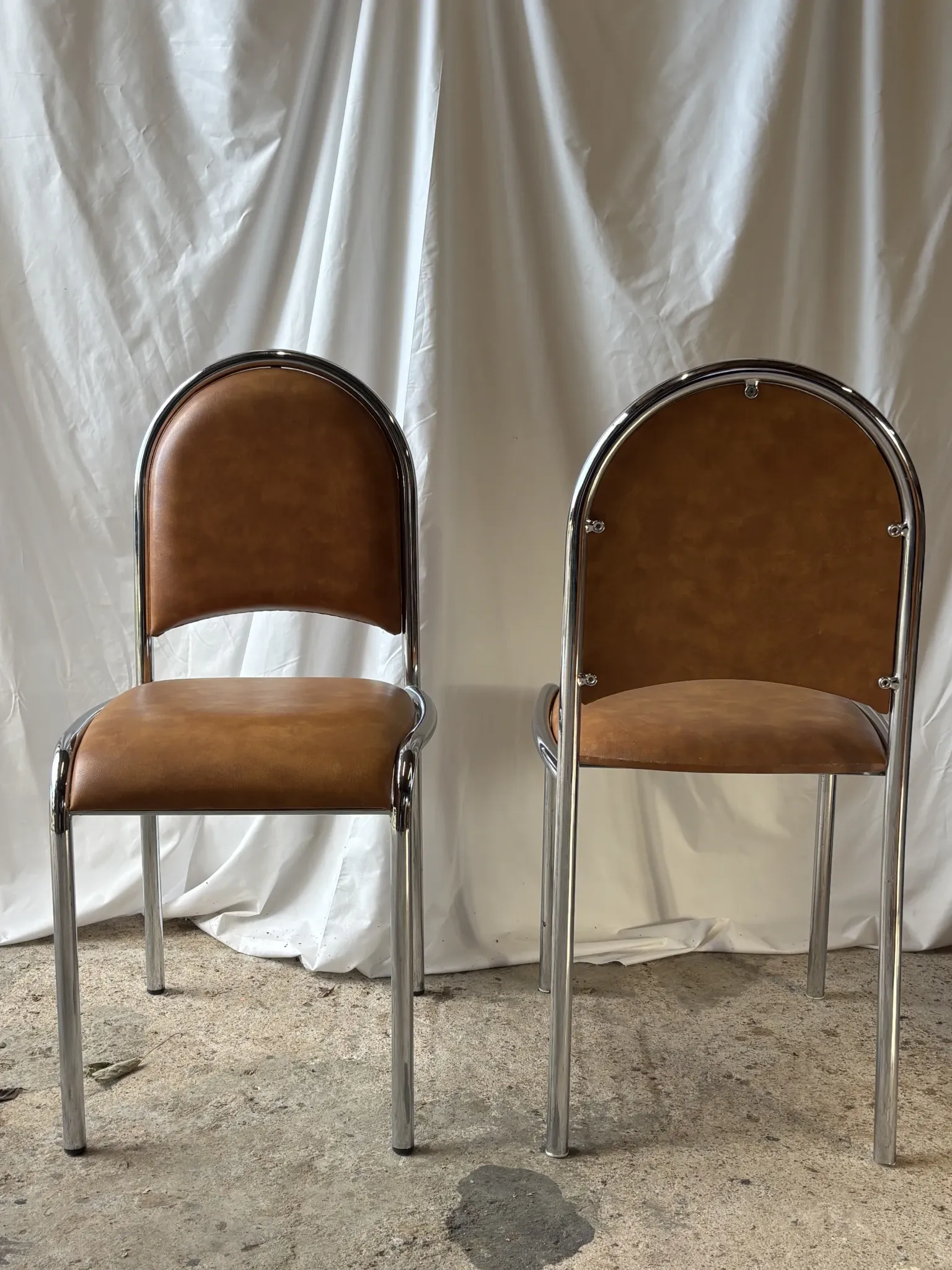 Set of 4 vintage tubular chrome chairs