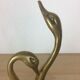 Couple of brass swans