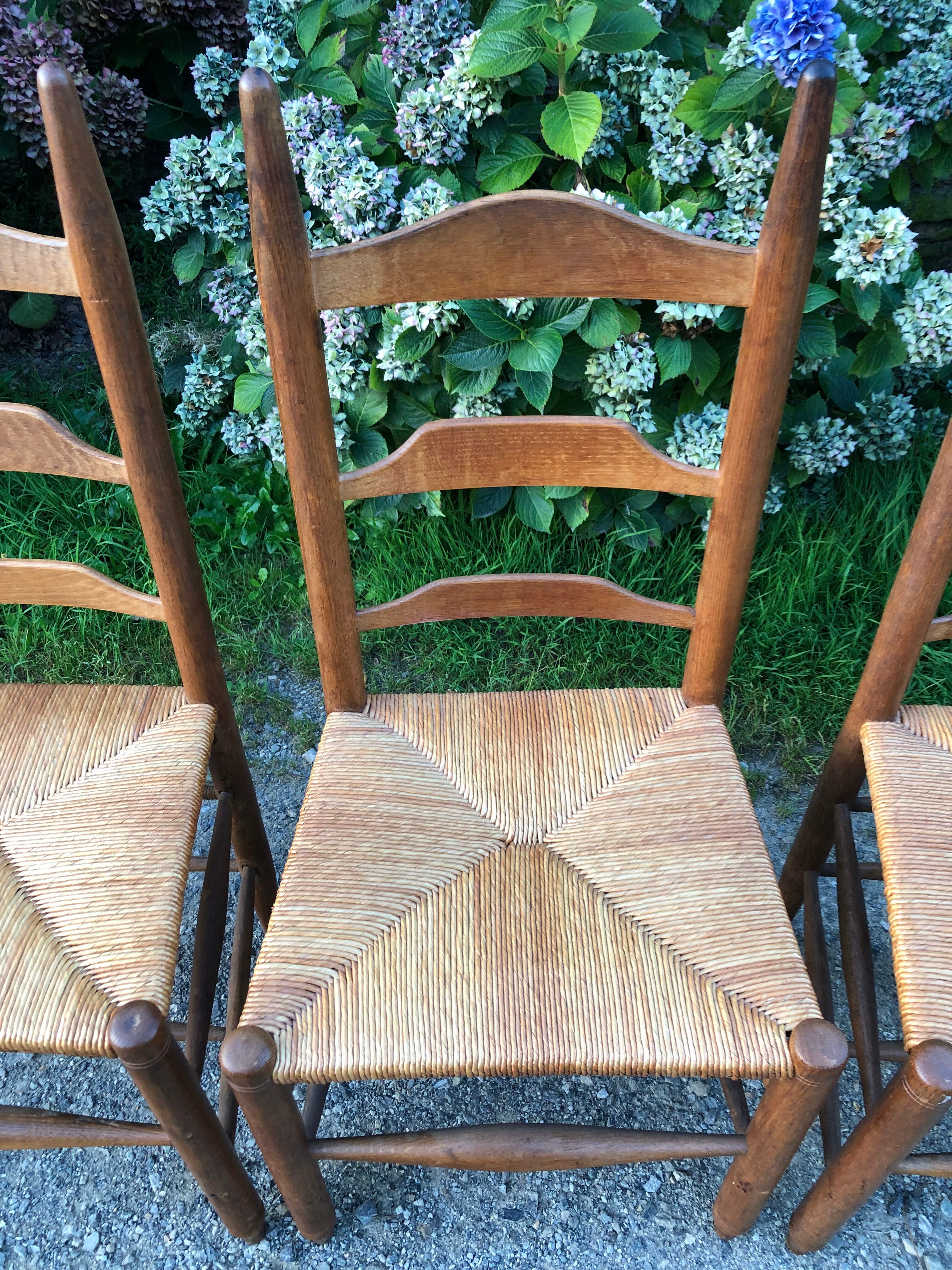 4 oak mulched chairs