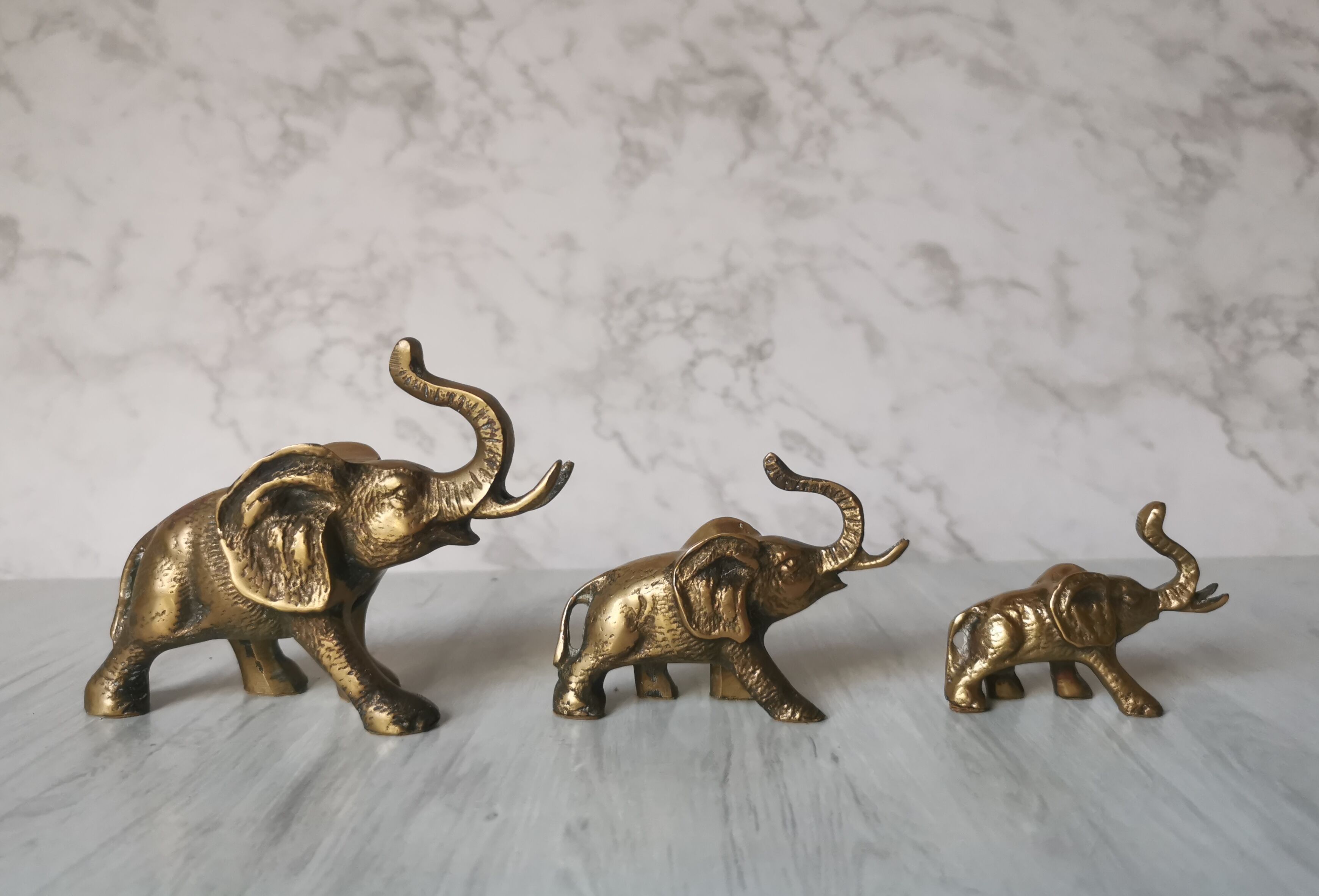 Trio of brass elephants