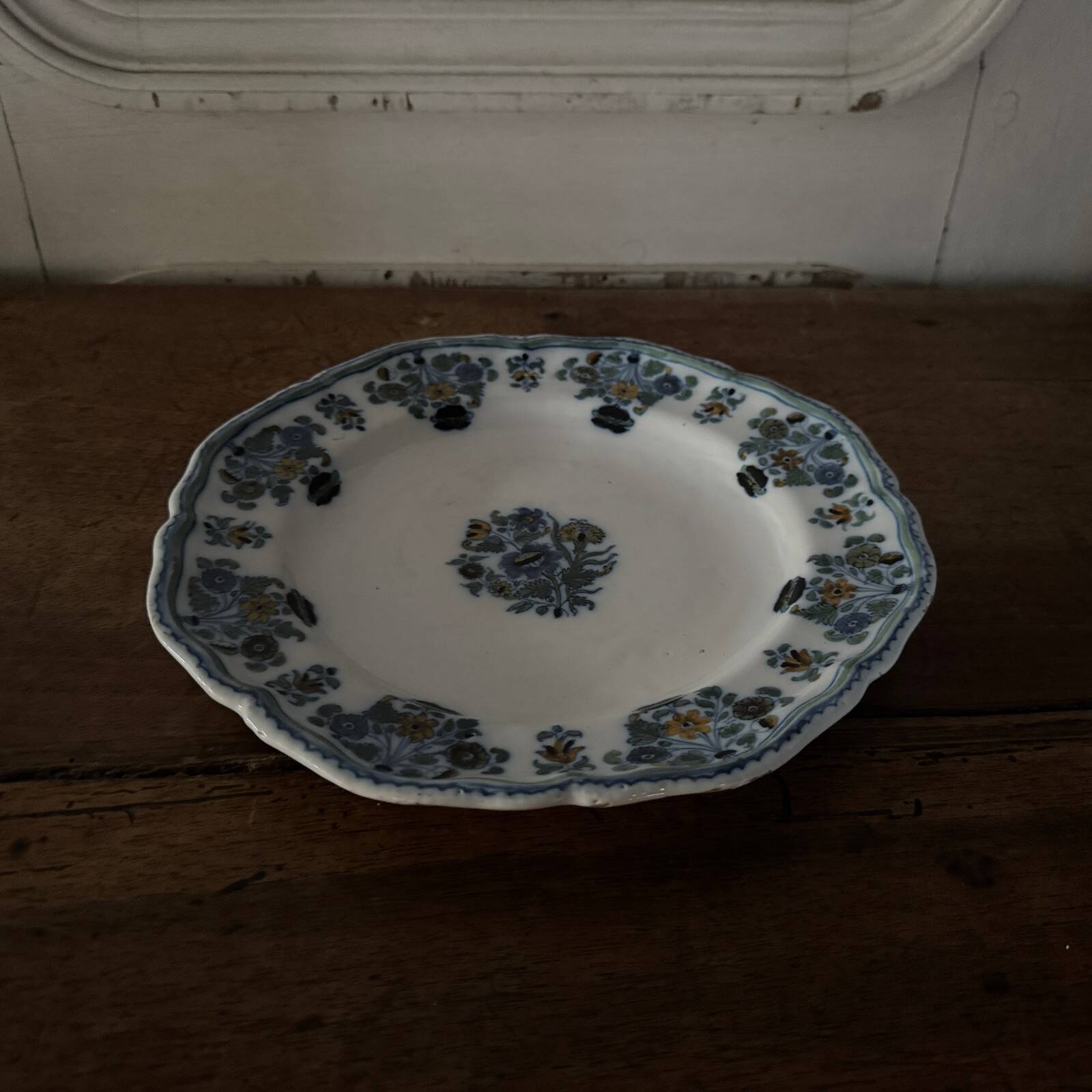 18th-century Moustiers earthenware plate with floral decoration