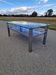 Table basse inox et verre fumé 