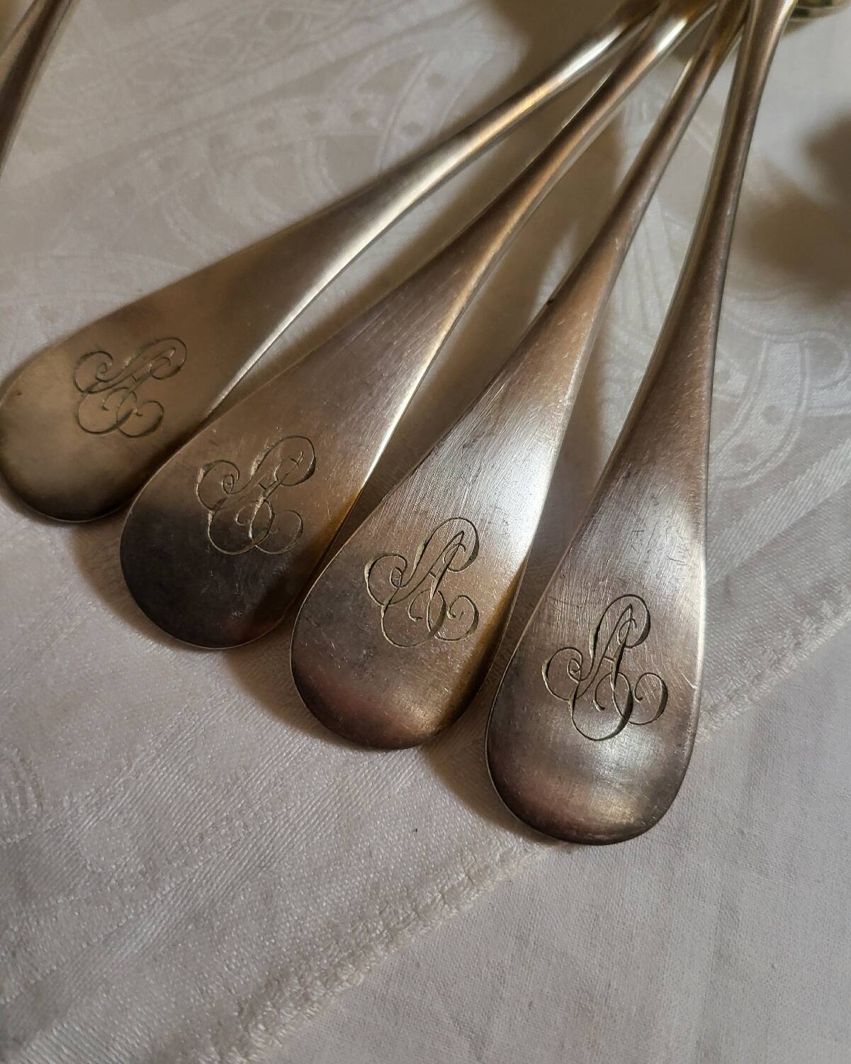 10 silver plated metal table spoons