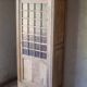 Glass-fronted cabinet from 1915, solid wood.
