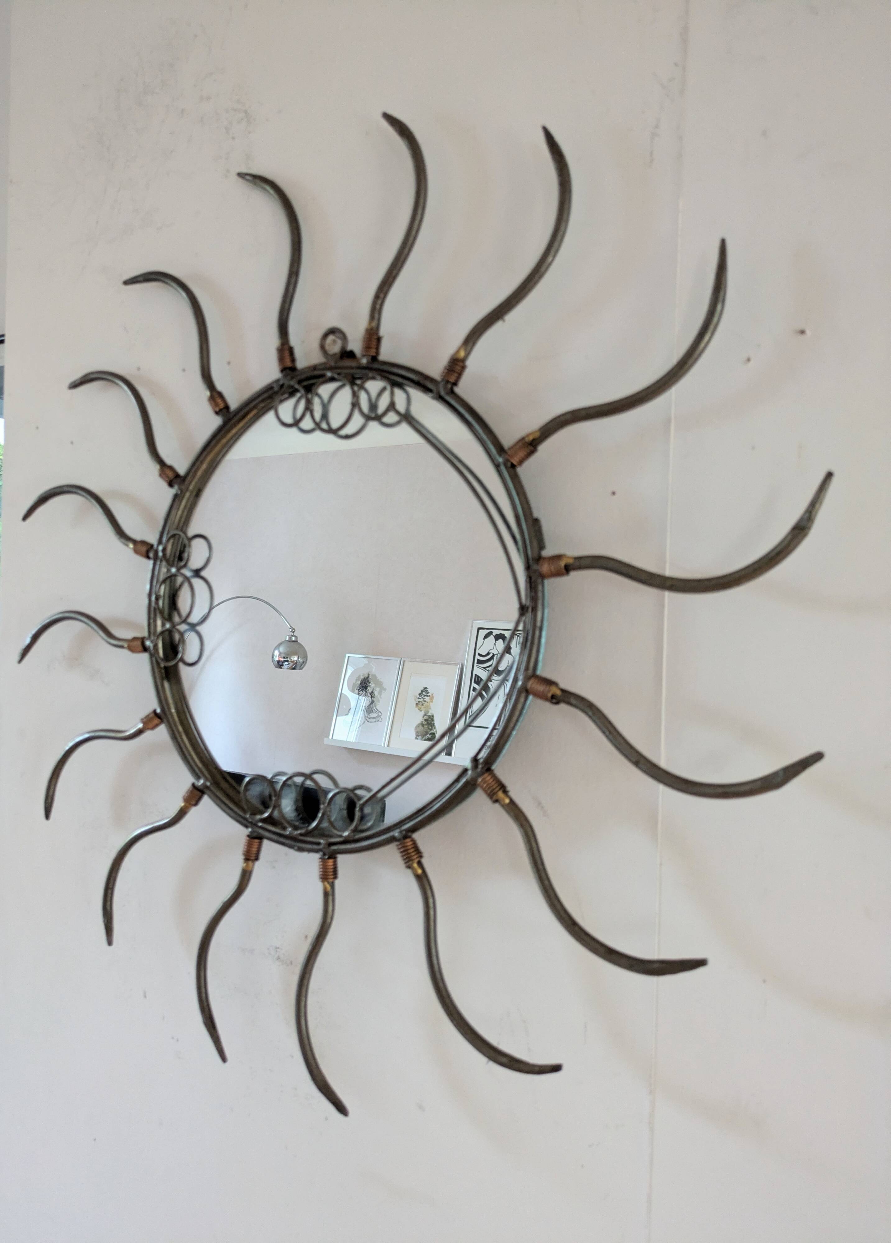 Metal sun mirror