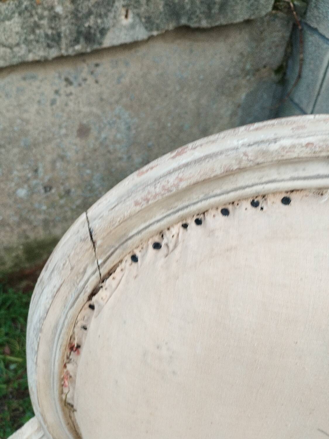 Antique armchair in Louis XVI style from the late 19th century.