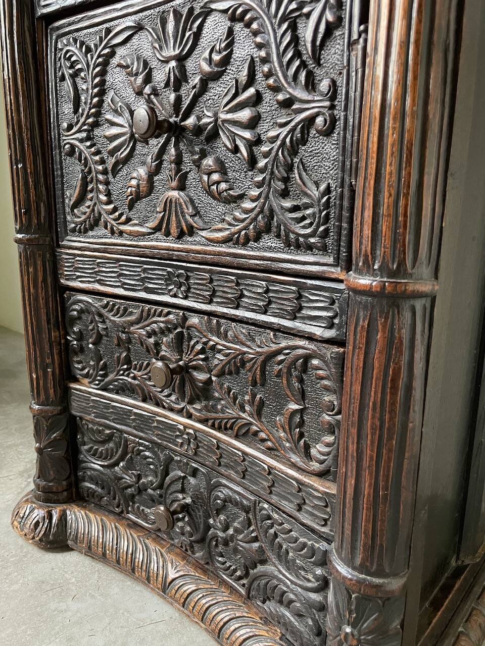 19th century chest of drawers in carved blackened pine