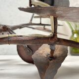 Wall lamp in wrought iron.