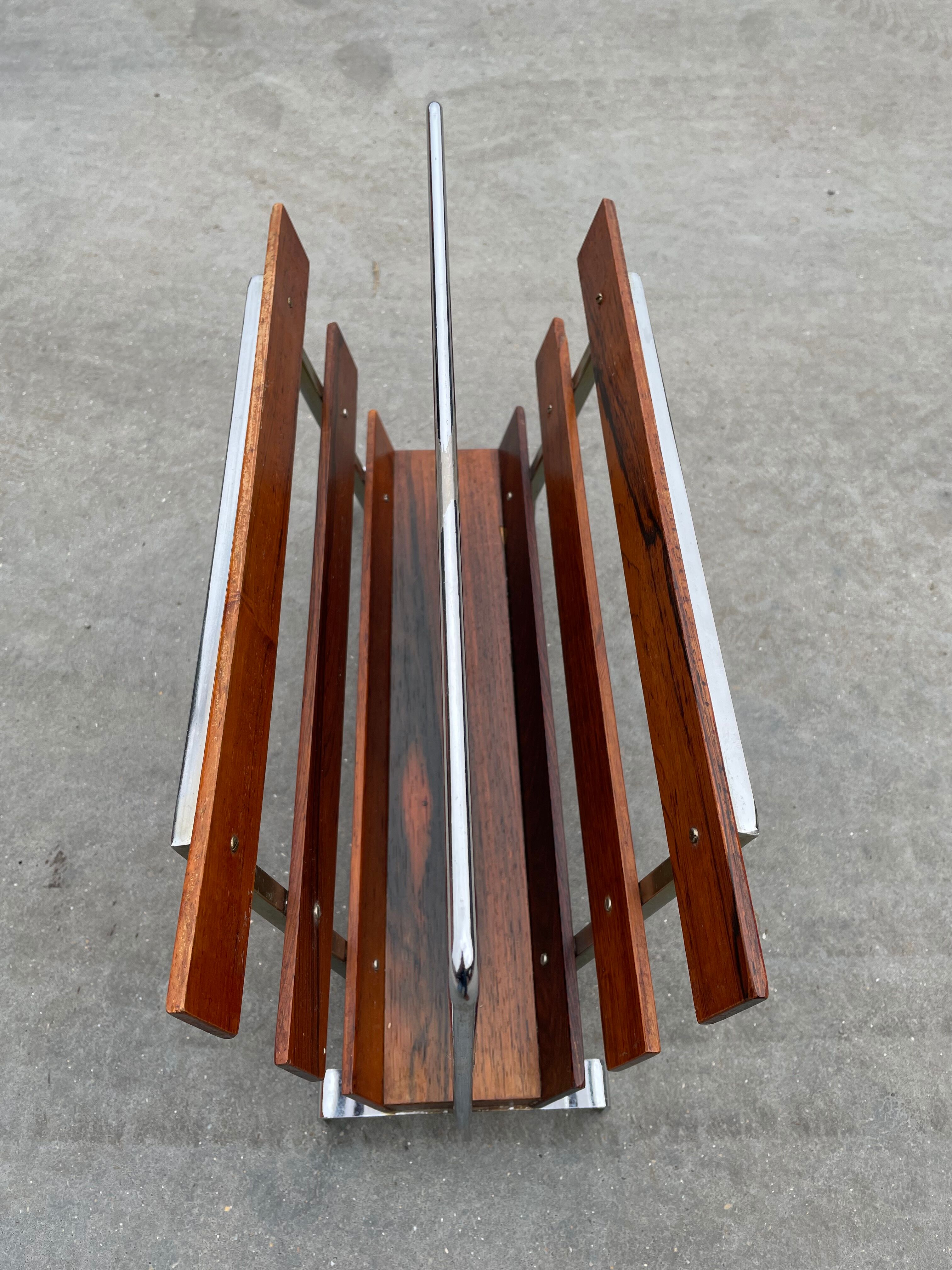 Vintage magazine rack from  rosewood and chrome design
