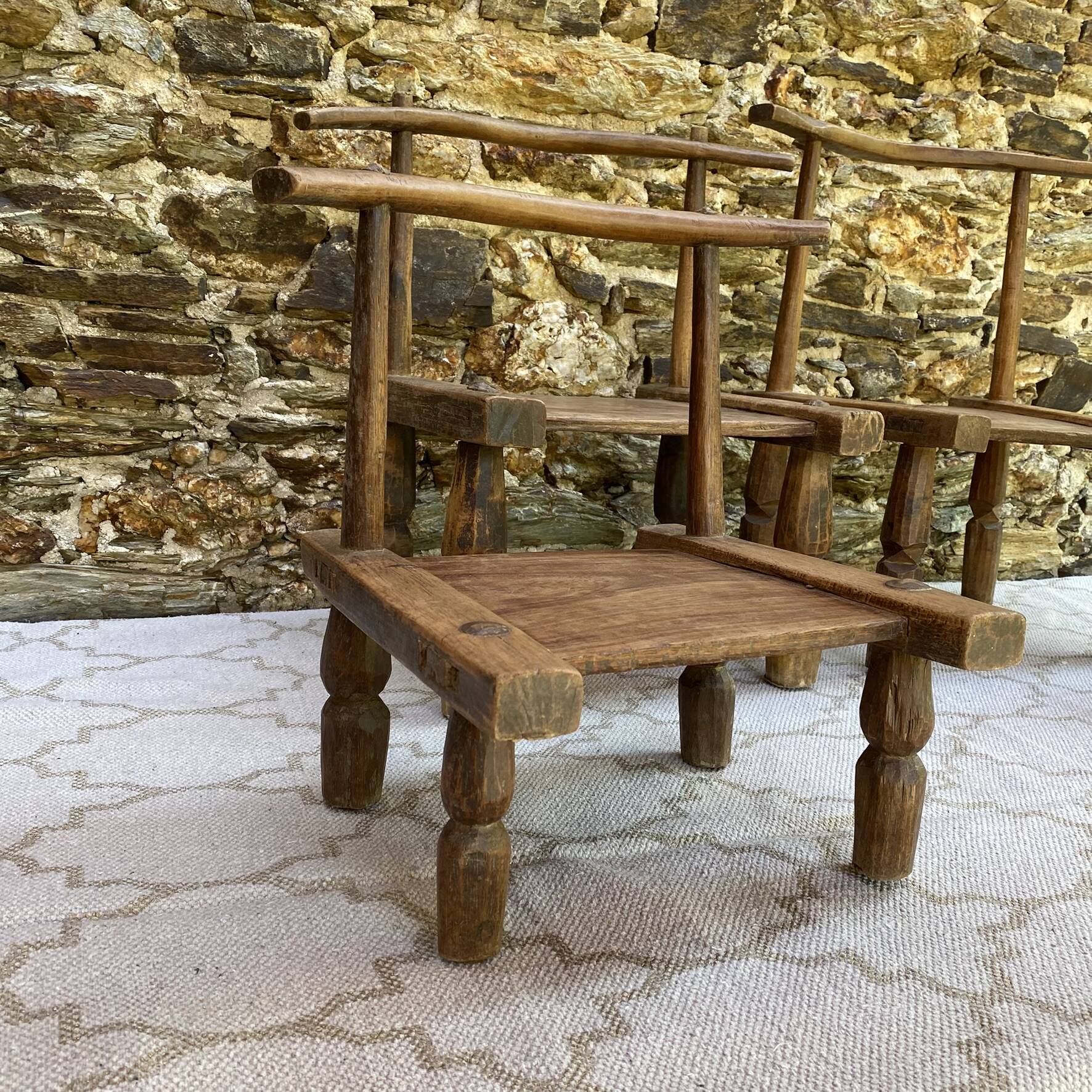 Ancient Baoulé African chairs in carved wood, Wabi-Sabi.
