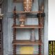 Napoleon III spool shelf, floor-standing shelf with brass tips.
