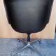 Fauteuil Charles Pollock cuir noir époque 1970