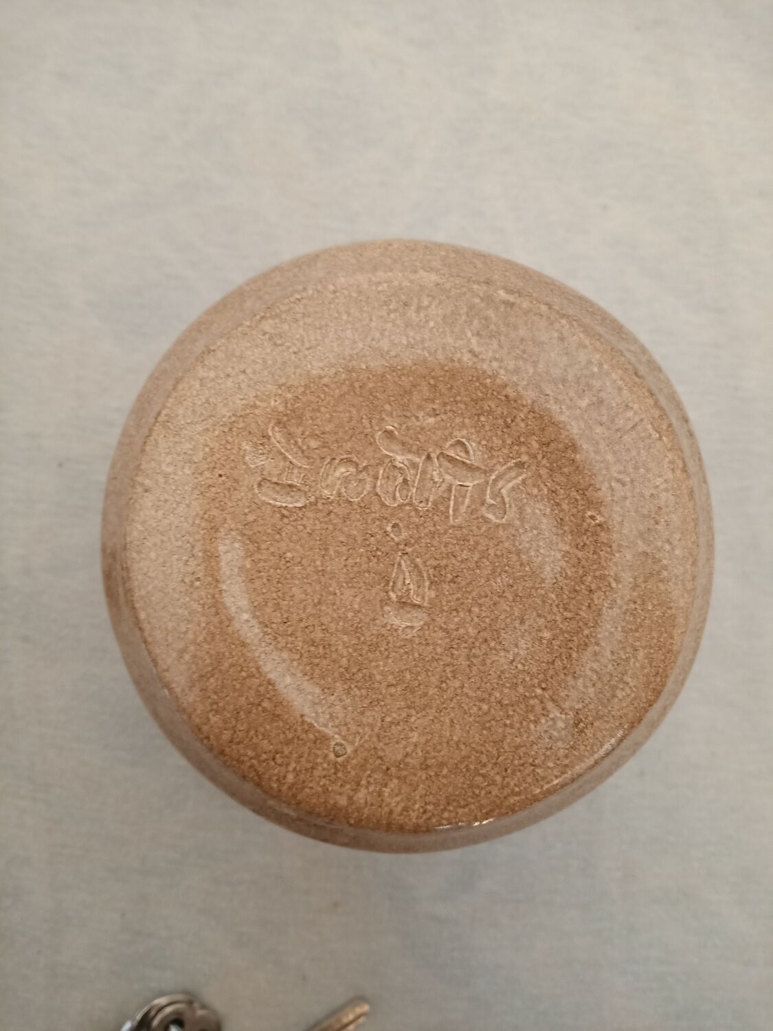 Signed stoneware milk jug