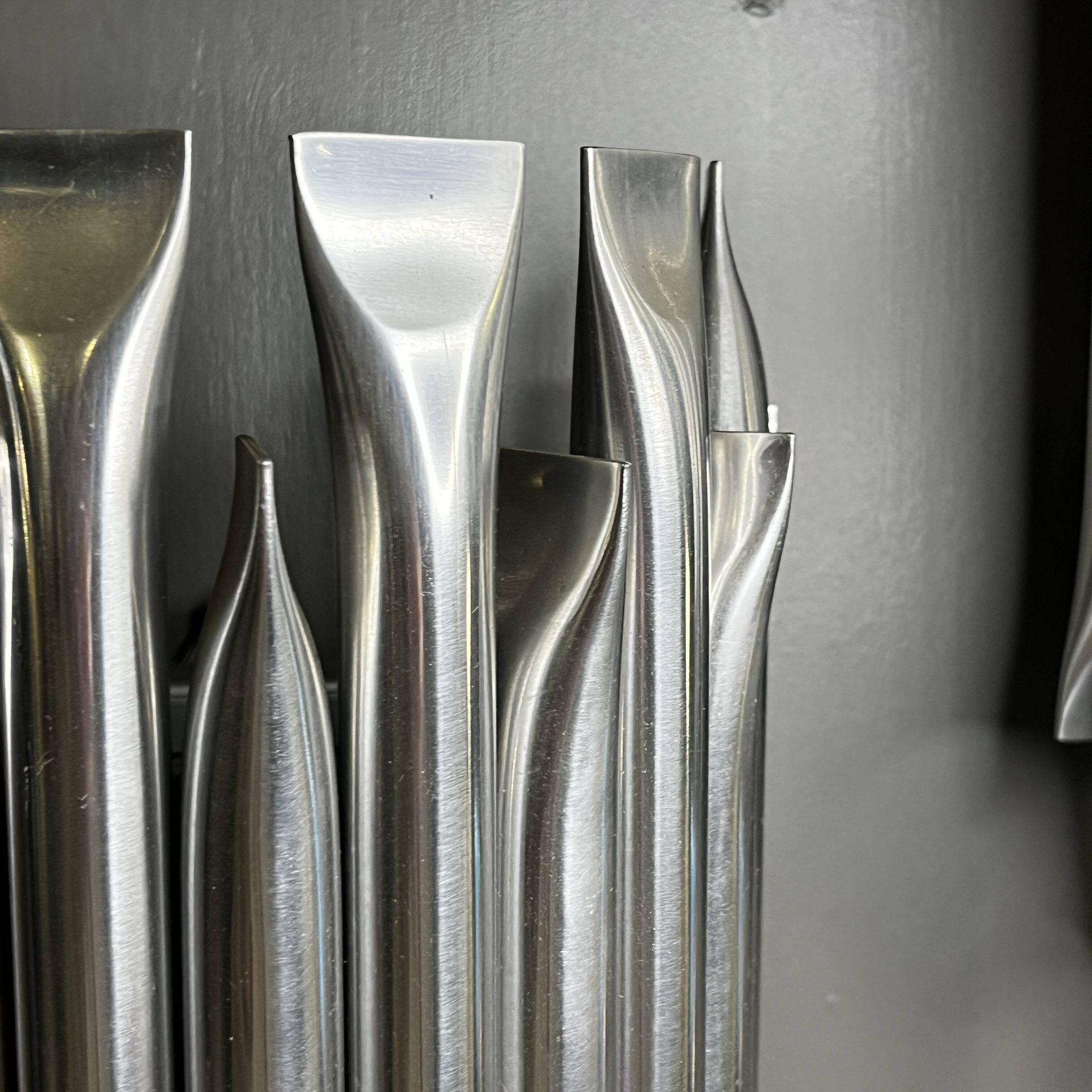 Raak 'concorde' pair of wall lights, 'organ tube' type in brushed aluminium, ca 1970