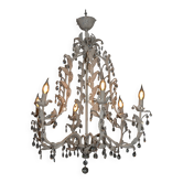 Large cage chandelier in aged metal.