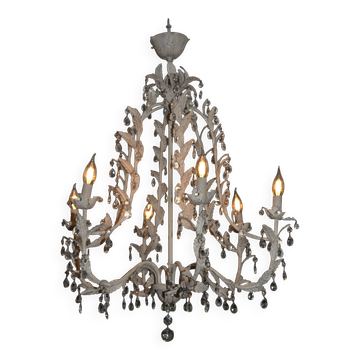 Large cage chandelier in aged metal.