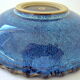Cut or pocket in polychrome varnished sandstone with a blue and floral decoration