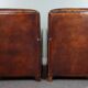 A very beautiful set of 2 Art Deco design armchairs in sheep leather
