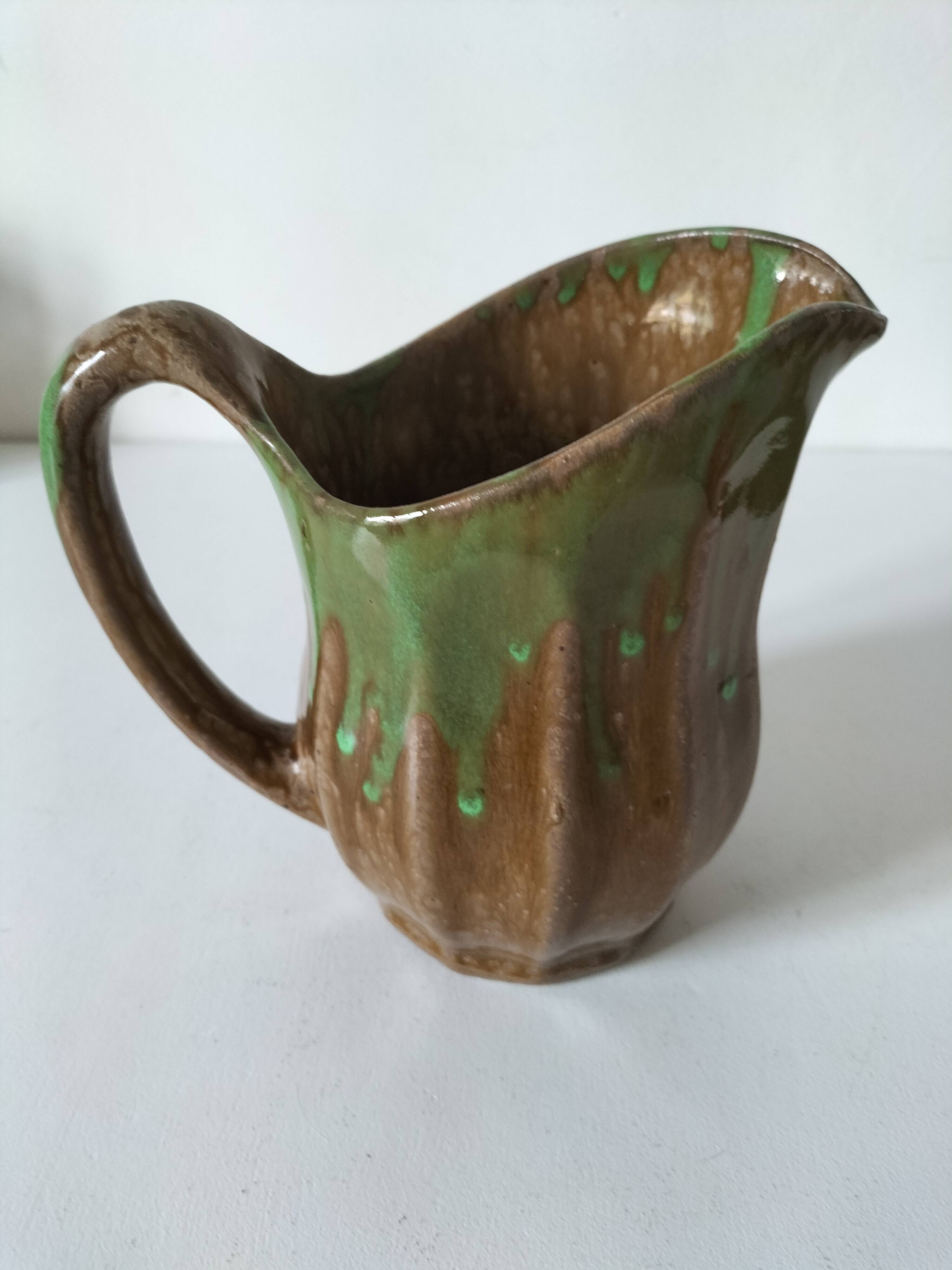 Handcrafted green and brown glazed ceramic pitcher, 1960s-70s