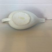 White porcelain sauceboat antique baby bottle