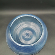 Blue ceramic bowl and its undercut