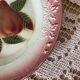 Antique shallow dish in slipware with pear decoration.