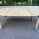 Scandinavian round extendable dining table stripped in solid wood from the 1970s.