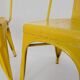 Pair of Tolix Chairs in yellow metal by Xavier Pauchard