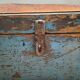 Antique wooden trunk with blue patina