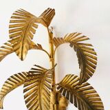 Golden palm leaf sconce
