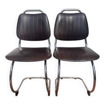 Chrome cantilever sled chairs with skai from the 1970s.