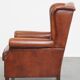 Fauteuil à oreilles de style anglais en cuir de vachette