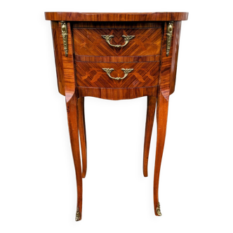 Old oval bedside table in rosewood marquetry Louis XV style