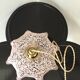 Suspension vintage opaline rose mouchetée et laiton