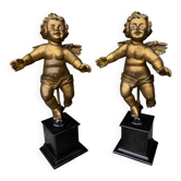 Pair of gilded cherubs on a Napoléon III base