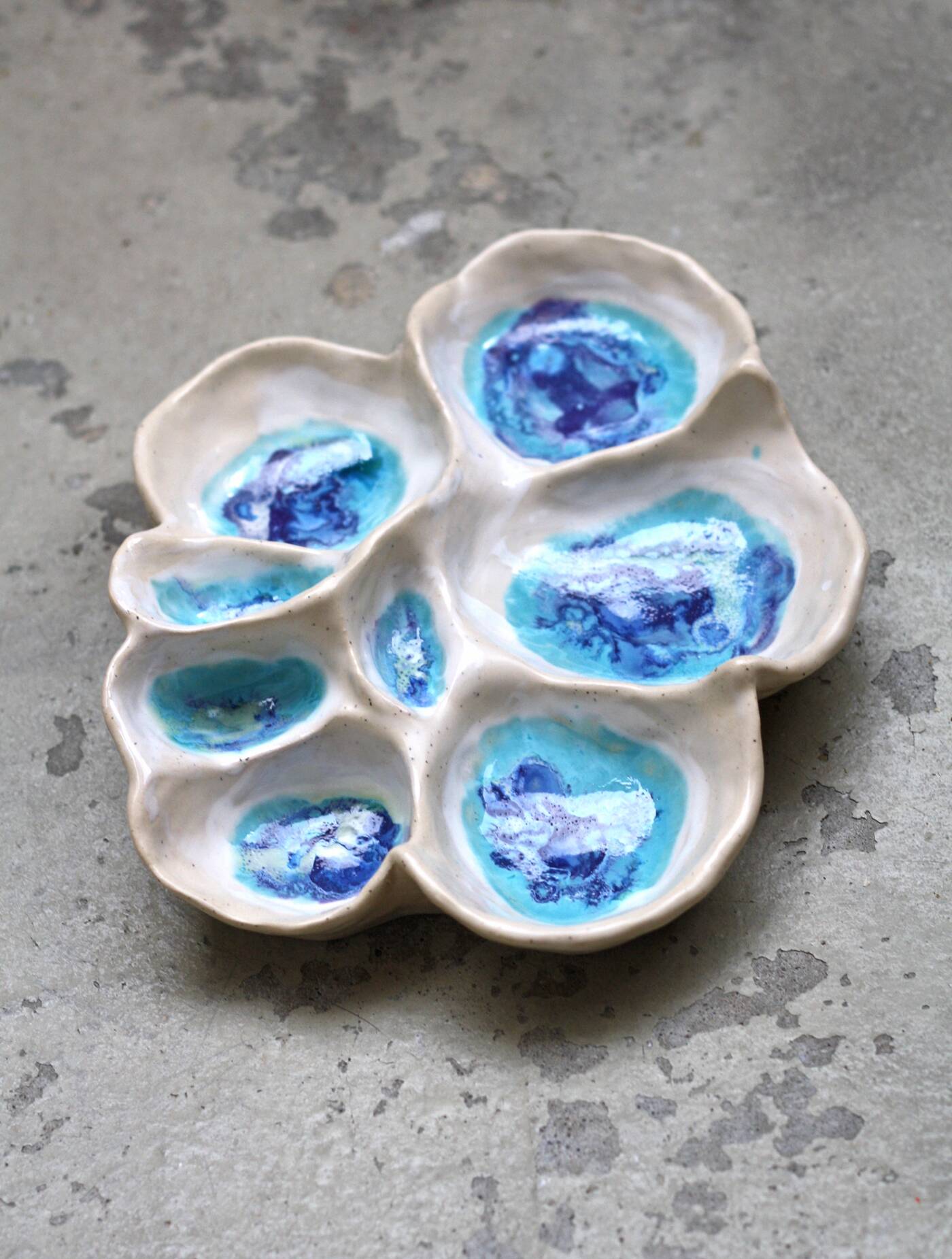 white handmade large ceramic bowl as a jewelry holder or for tapas