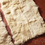 Beige goatskin rug in pair