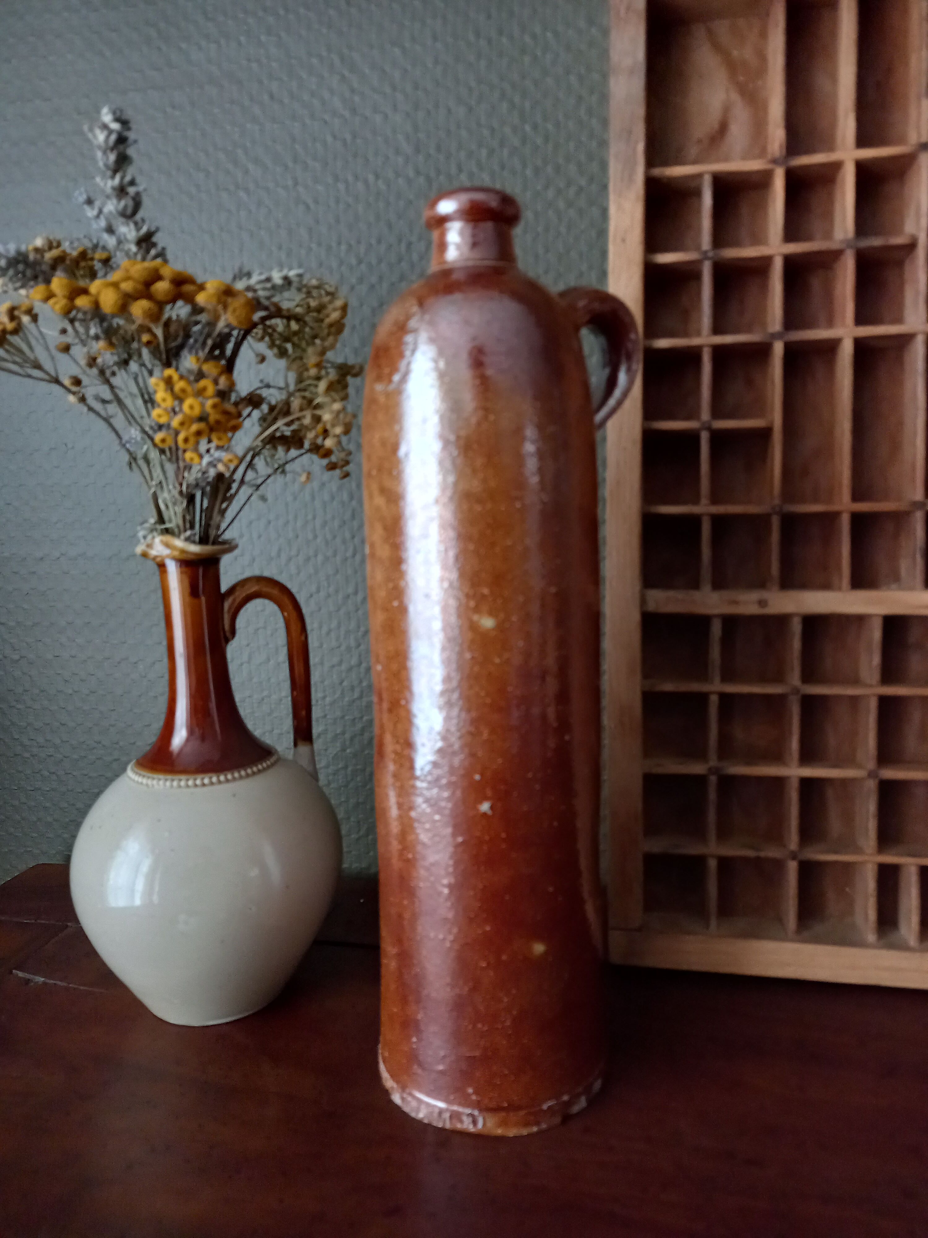 Brown glazed stoneware bottle Amsterdamsche, nineteenth century