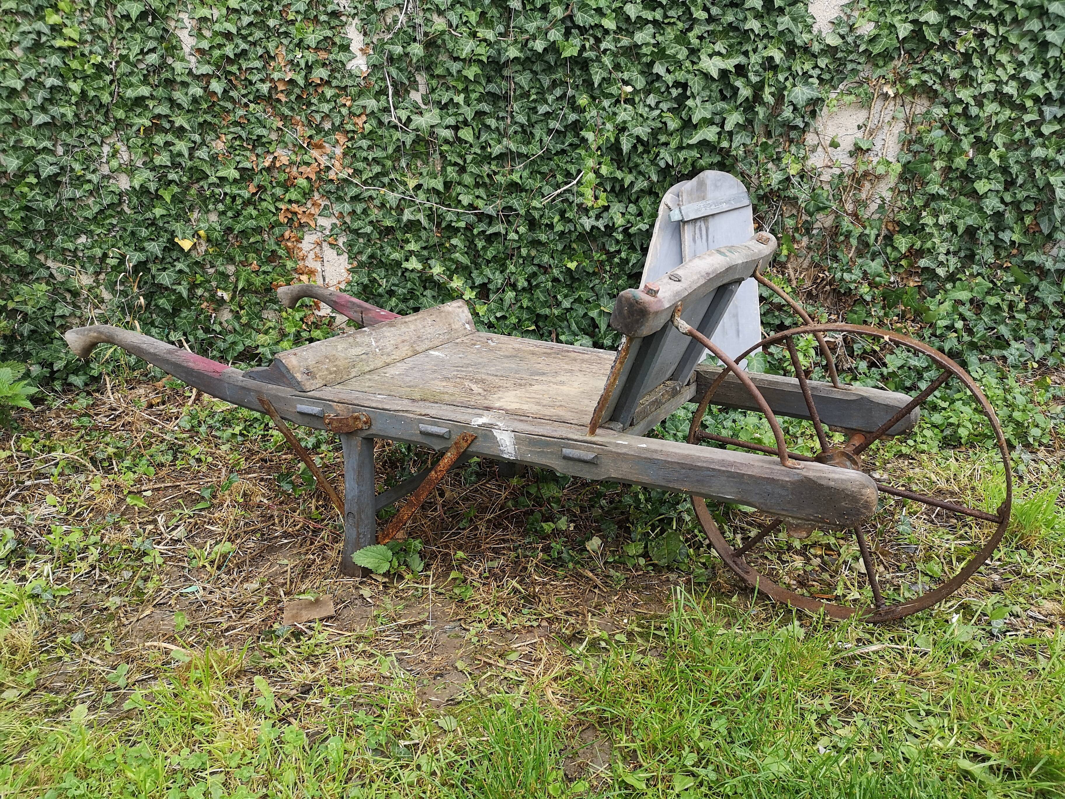 Wheelbarrow old folk art